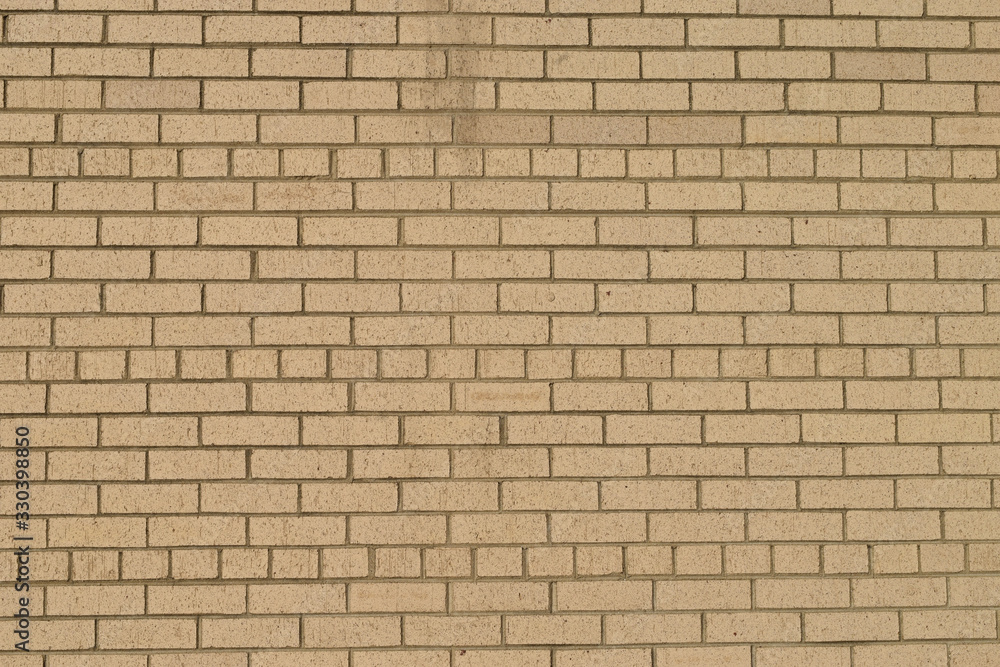 Abstract background of rustic tan brick wall Abstract background of rustic tan brick wall