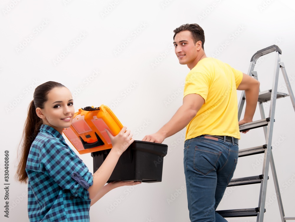 Wife and husband family doing home improvements Wife and husband family doing home improvements