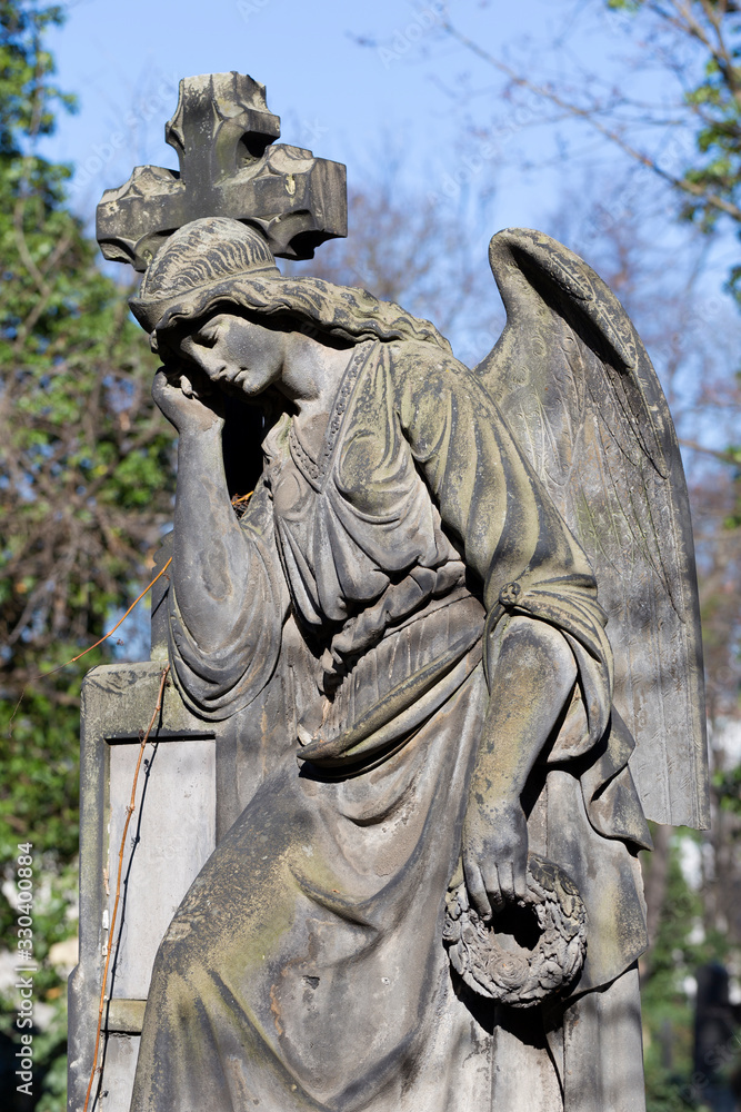Fototapeta premium The historic Angel from the mystery old Prague Cemetery, Czech Republic