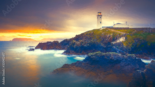 Twilight yields to dawn, sunrise at Fanad Head Lighthouse with blurred water of Atlantic Ocean
