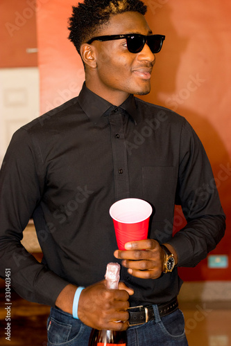 man with a glass of red wine