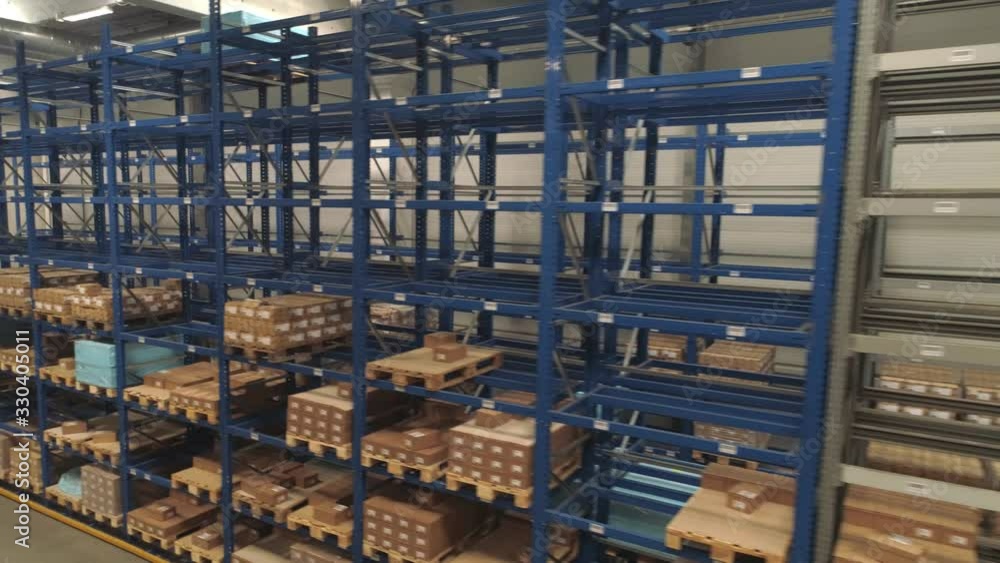 Flying through the big factory warehouse.