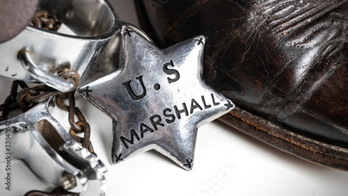 Western themed United States Marshall badge with cowboy boots and spurs