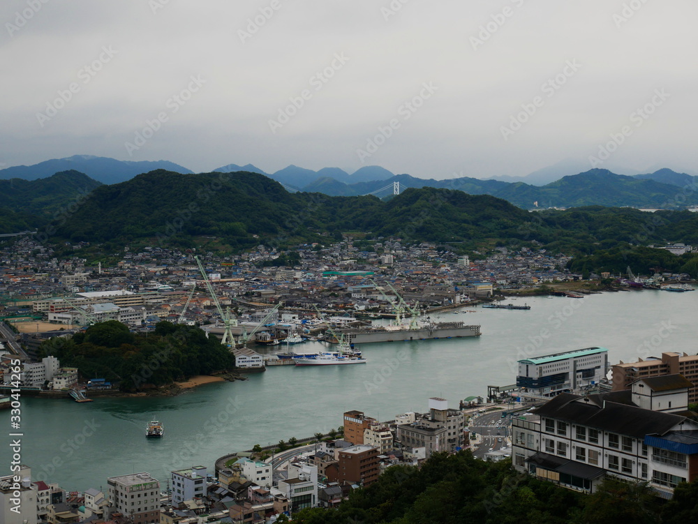 View over cloudy coastal Japanese city