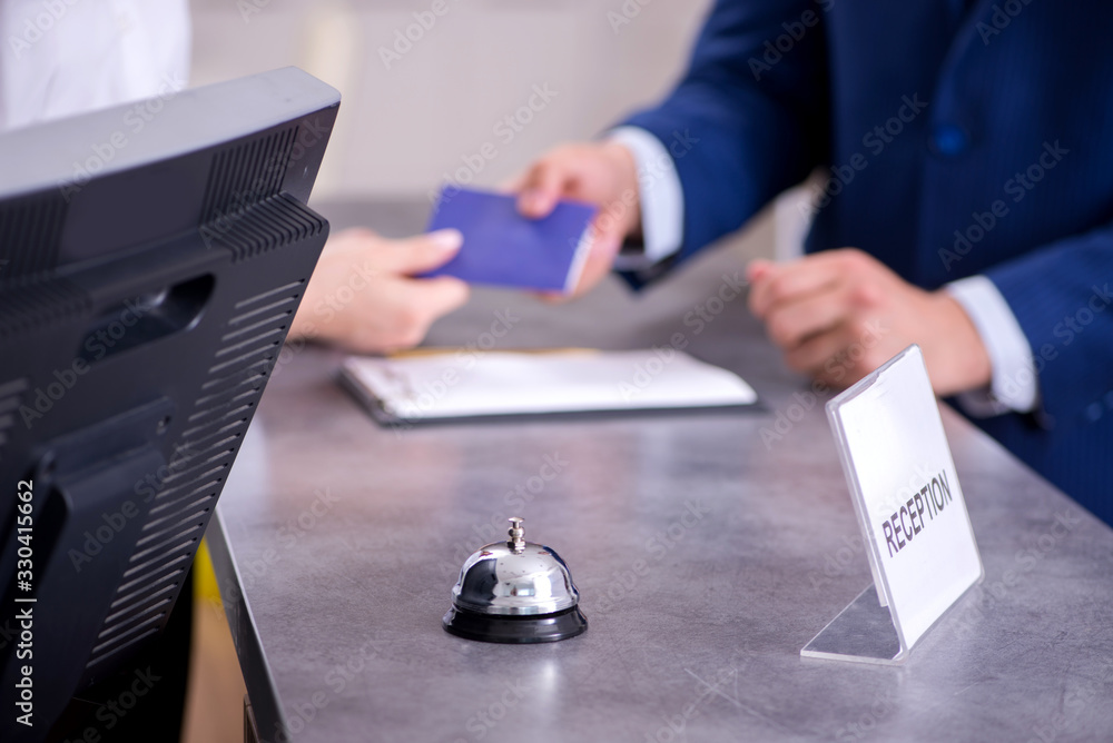 Fototapeta premium Hotel reception bell at the counter