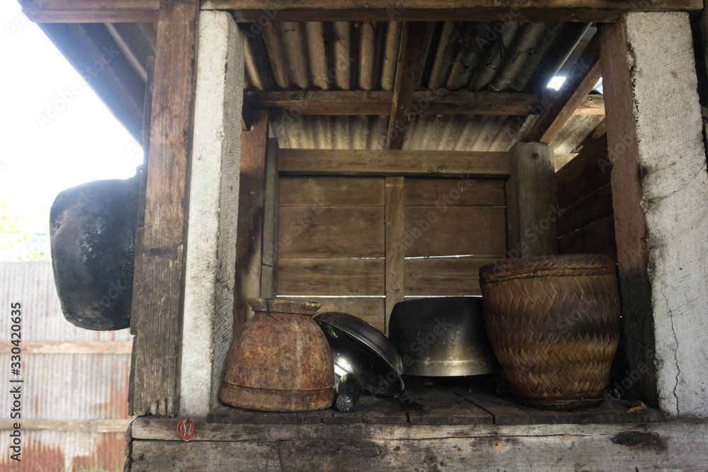 Old wooden pantry storage in countryside of Thailand