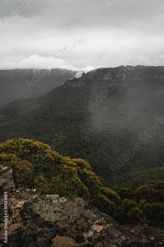 The view of the Three Sisters as seen from Sublime Point Lookout on a moody rainy day.