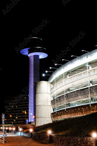Photography Stockholm, Sweden  The control tower and a parking garage at night