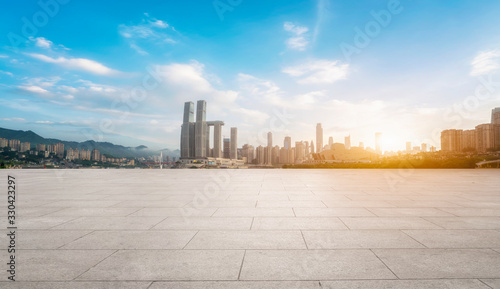 The architectural landscape and urban skyline of the square floor tile with empty foreground..