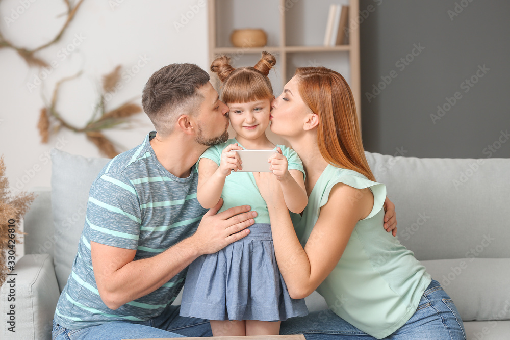 Family taking selfie at home Family taking selfie at home