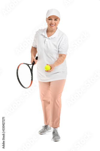 Mature female tennis player...