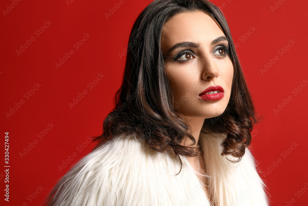 Young woman with beautiful makeup on color background Young woman with beautiful makeup on color background