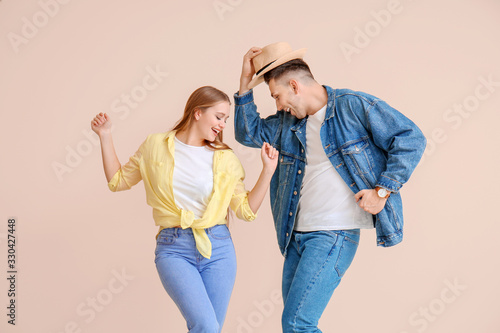Happy young couple dancing ...