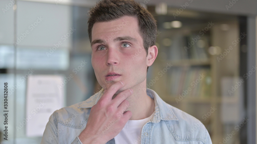 The Portrait of Young Designer Thinking about Creative idea The Portrait of Young Designer Thinking about Creative idea