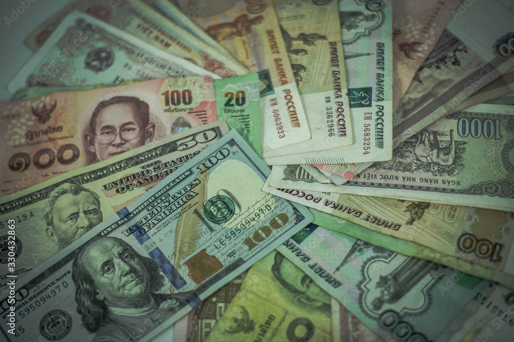 A collection of international currencies. Dollar bill, Bank note. Money Exchange Finance Business concept. A collection of international currencies. Dollar bill, Bank note. Money Exchange Finance Business concept.