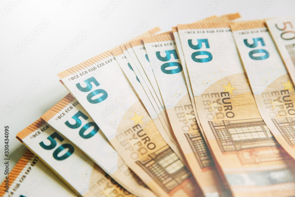 Layout of money on a white background Flatley. Paper money account in Europe. 50 Euro banknotes. Layout of money on a white background Flatley. Paper money account in Europe. 50 Euro banknotes.