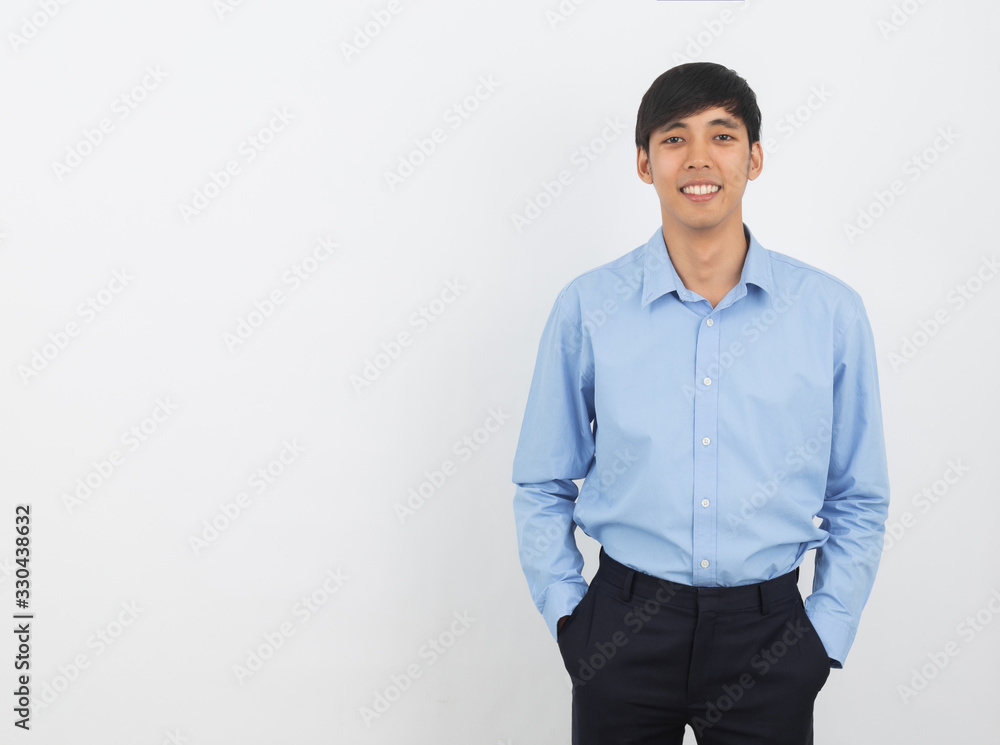 Young handsome asian business man looking to camera isolated on white background. Young handsome asian business man looking to camera isolated on white background.