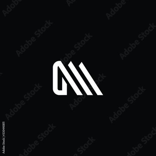  Minimal elegant monogram art logo. Outstanding professional trendy awesome artistic GM MG initial based Alphabet icon logo. Premium Business logo White color on black background