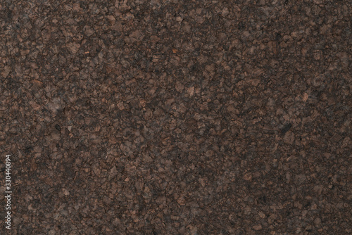 Texture of dark cork with oil finish photo