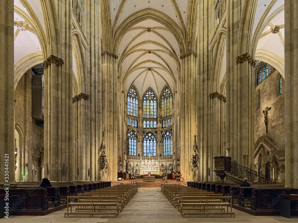 Interior of Regensburg Cathedral, Germany. The cathedral was built from 1275 to 1520. It has one of the most extensive surviving medieval stained glass windows in the German-speaking region.