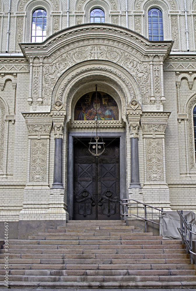 Marine Cathedral of St. Nicholas the Wonderworker. Fragment of the southern facade. Kronshtadt. Kronshtadsky district of Saint Petersburg. Kotlin Island. The Gulf of Finland. Marine Cathedral of St. Nicholas the Wonderworker. Fragment of the southern facade. Kronshtadt. Kronshtadsky district of Saint Petersburg. Kotlin Island. The Gulf of Finland.