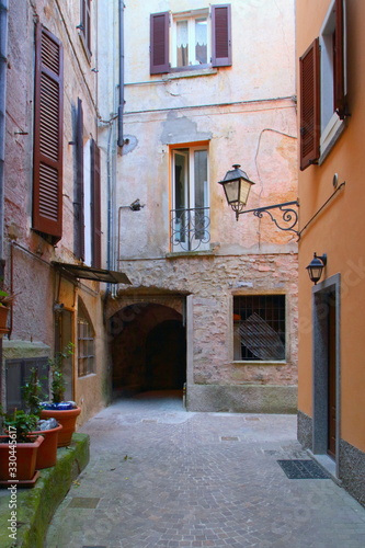 Fototapeta Naklejka Na Ścianę i Meble -  NARROW STREET IN ARGEGNO VILLAGE IN ITALY