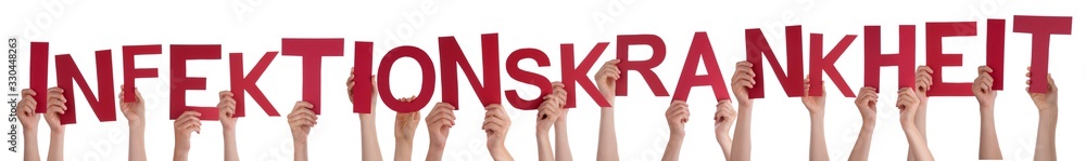 Fototapeta premium People Hands Holding Red German Word Infektionskrankheit Means Infection Sickness. White Isolated Background