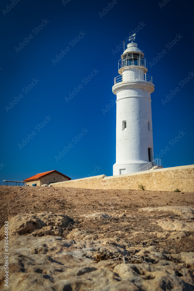 lighthouse on coast of sea