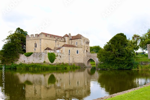 Leeds Castle, England. It is built on islands in a lake formed by the River Len to the east of the village of Leeds.