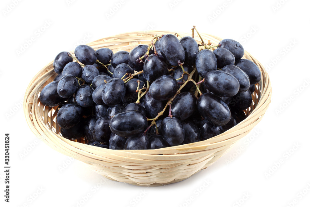 Grape on wicker plate Grape on wicker plate