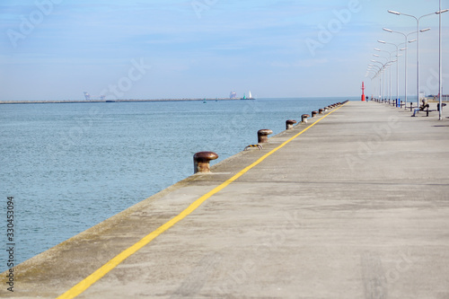 empty concrete floor of pier at port .
