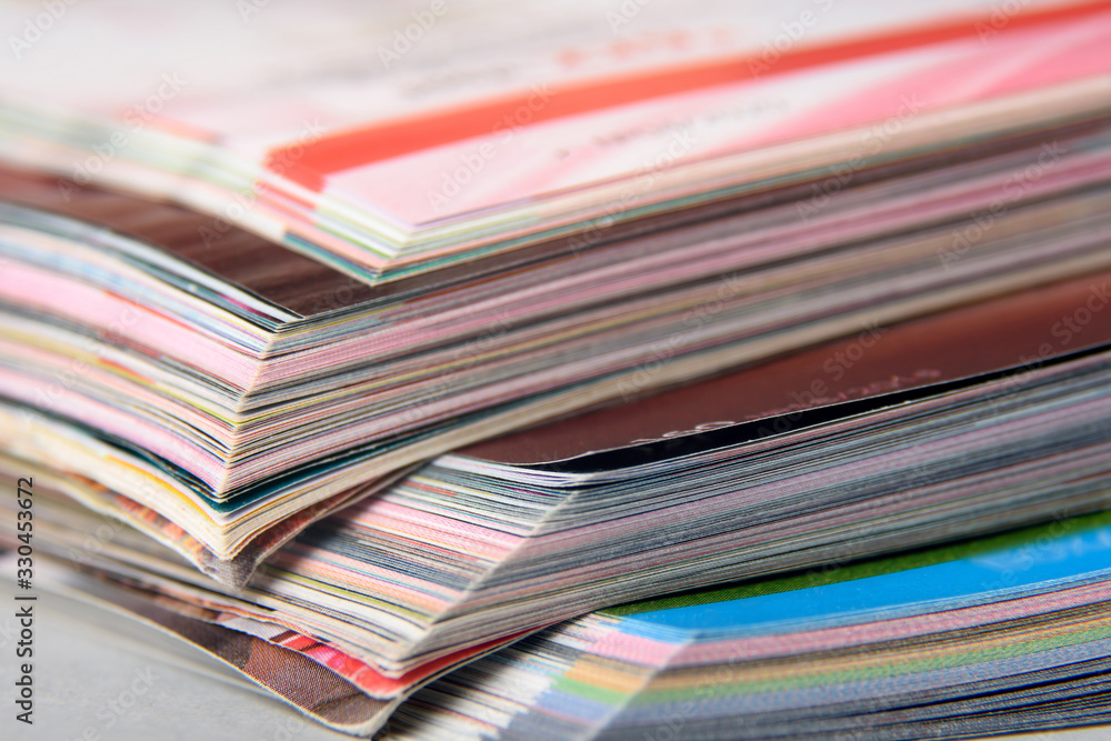 Abstract background image of stacked magazines. Selective focus Abstract background image of stacked magazines. Selective focus