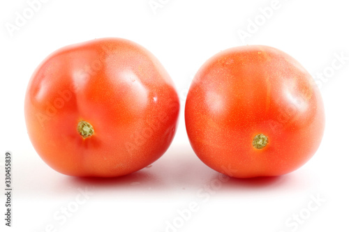 Two red tomatoes