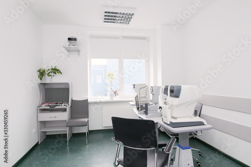 office ophthalmologic clinic. visual examination equipment. devices for the treatment of vision. ophthalmology operation room. equipment for laser vision correction operating © mihail_pustovit