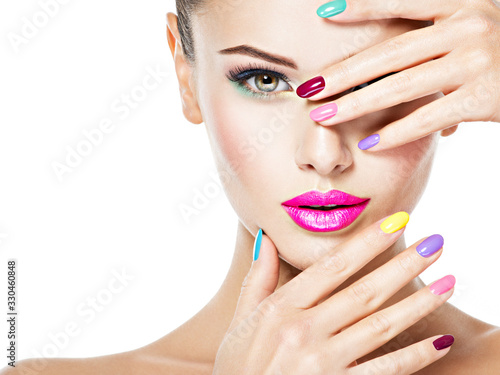 beautiful woman  with colored nails photo