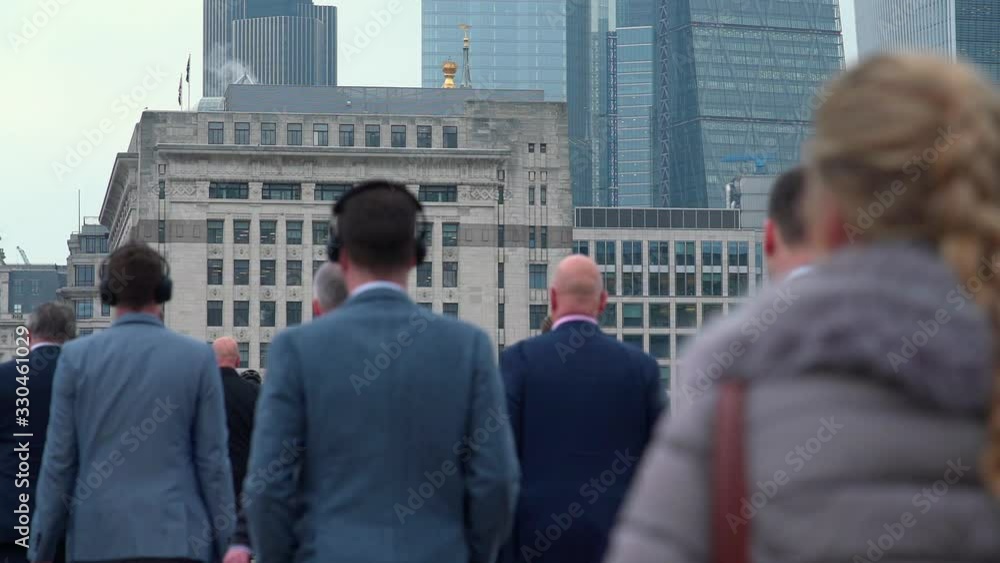 Crowd of pedestrian commuters in London on cool morning in slow motion. Clip 02a Crowd of pedestrian commuters in London on cool morning in slow motion. Clip 02a