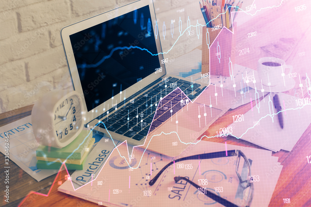 Double exposure of forex chart and work space with computer. Concept of international online trading. Double exposure of forex chart and work space with computer. Concept of international online trading.