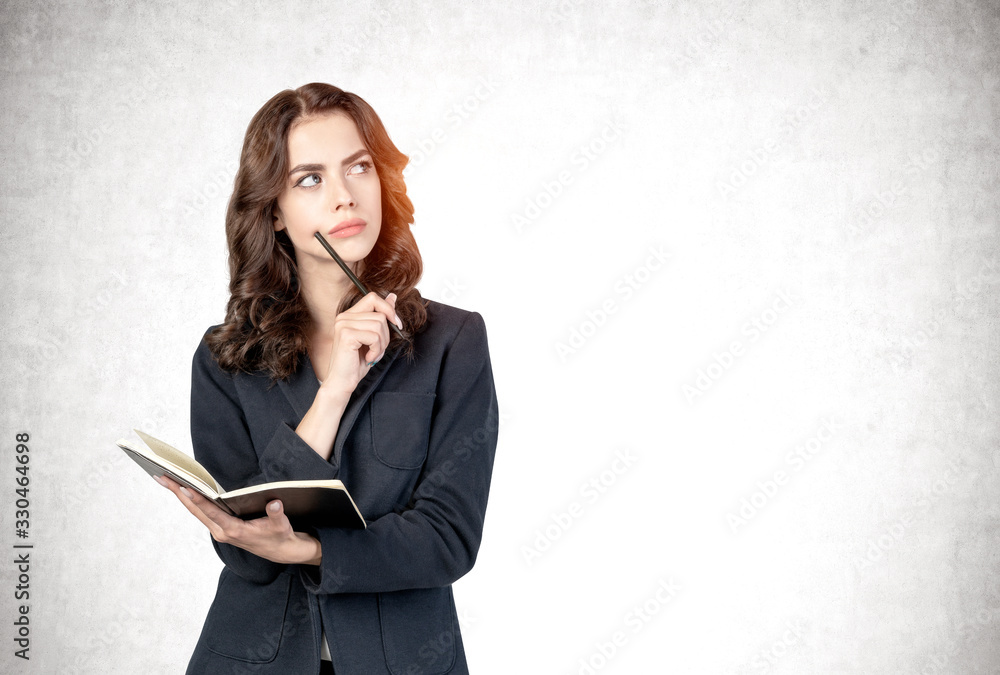 Thoughtful businesswoman with notebook, mockup Thoughtful businesswoman with notebook, mockup