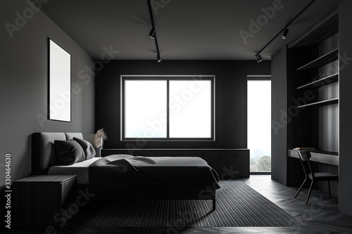 Gray and wooden bedroom with table and window