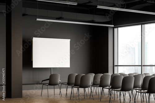 Mock up screen in gray office lecture hall