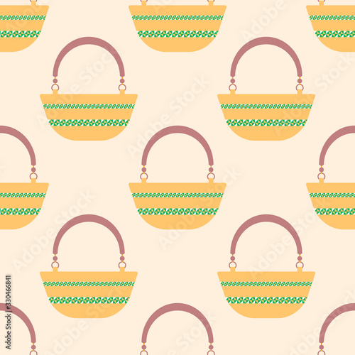 Seamless pattern with yellow oval beach bag with green geometric pattern on pink background.Bright summer pattern for textiles.For beachwear.Vector illustration