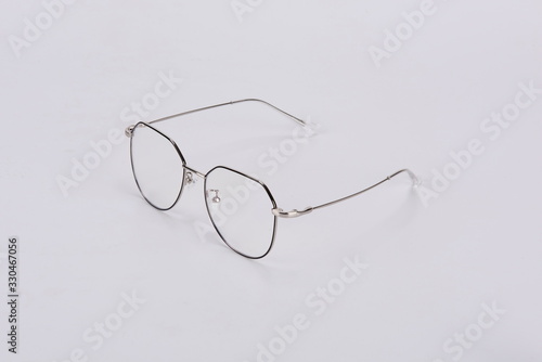 Delicate myopia glasses, thin frame in white background