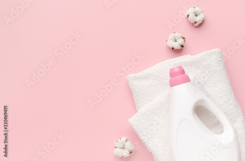 White plastic packaging of liquid powder, washing conditioner