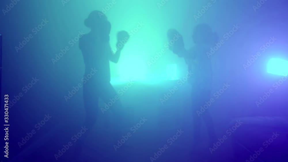 Active little girl training boxing with her mother. Equality concept. Active little girl training boxing with her mother. Equality concept.