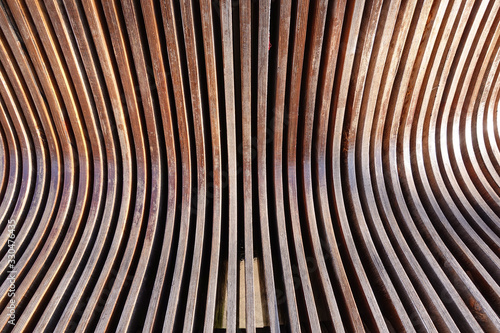 Slika na platnu Abstract background of brown wooden curves. Smooth bends