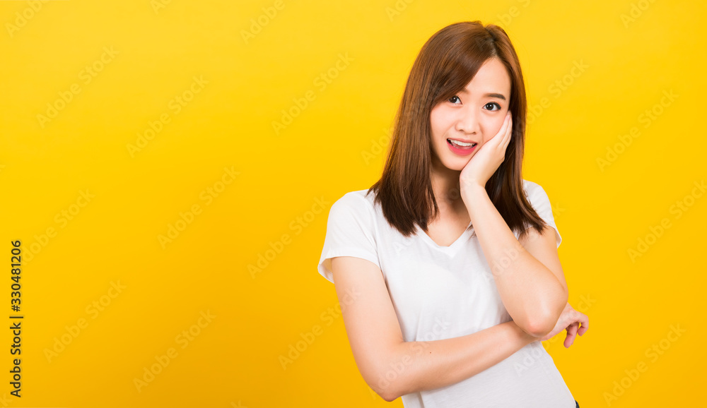woman teen standing wear white t-shirt posting rest chin on hand woman teen standing wear white t-shirt posting rest chin on hand