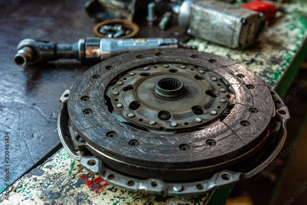 the clutch of the car close up failed and is repaired at the car service