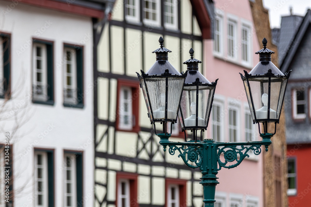 Half-timbered house and street lamps in Bad Muenstereifel