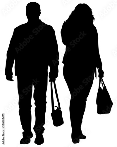 Young man and woman walking down street. Isolated silhouette on a white background