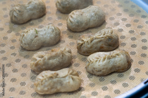 Steaming Korean Dumplings in Hot Pot. photo